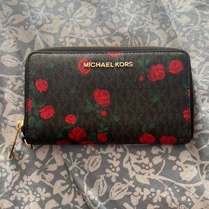 Michael Kors black rose printed leather wallet